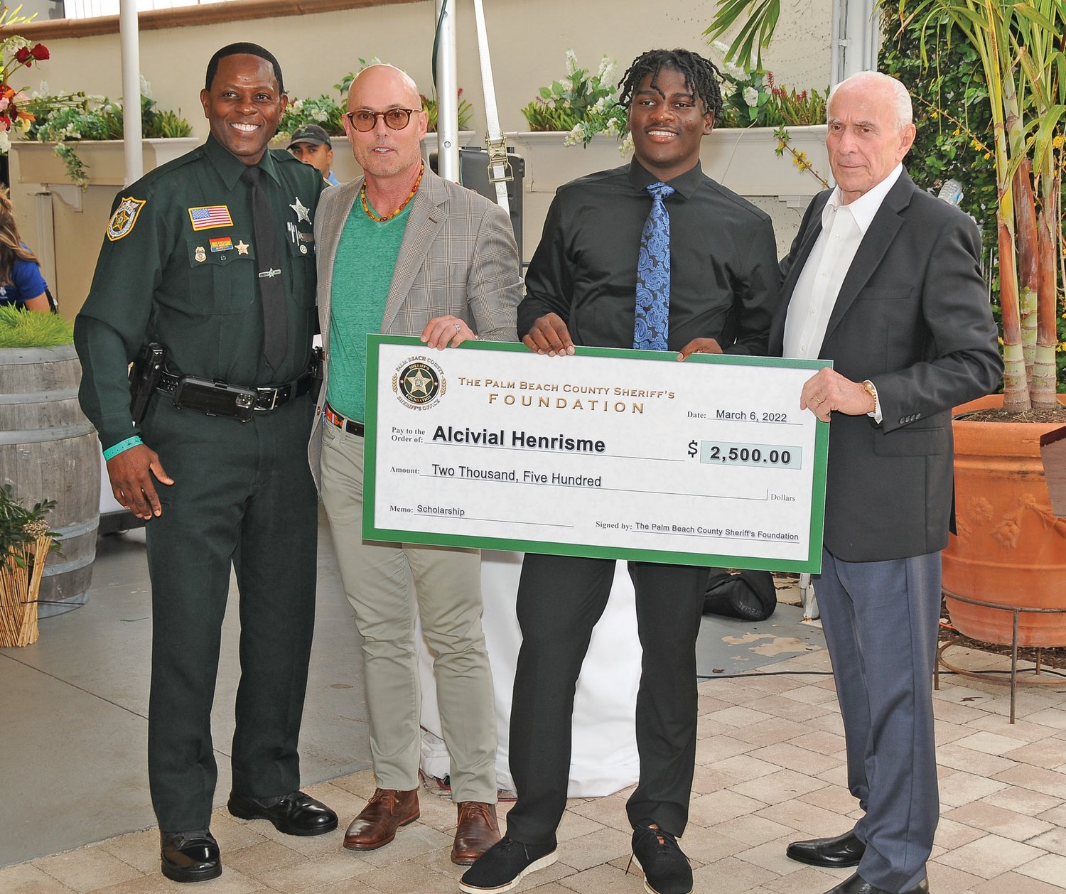PBSO Deputy Kenneth Torrence, Sheriff’s Foundation Director Lance Ivey, Alcivial Henrisme from Glades Central High School and PBSO Chief Deputy Frank DeMario